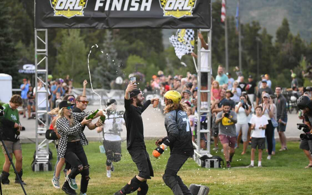 2021 Race for the Rail champion Tyler James is greeted at the finish line by a stoked Bodhi Harrison.