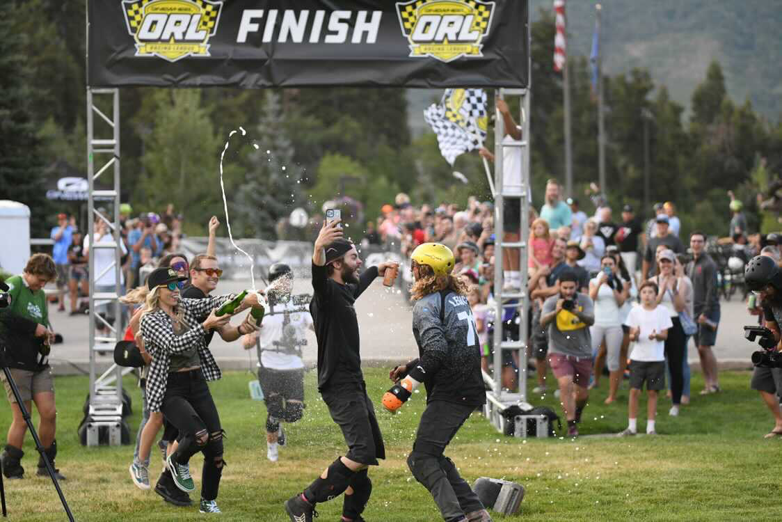 2021 Race for the Rail champion Tyler James is greeted at the finish line by a stoked Bodhi Harrison.
