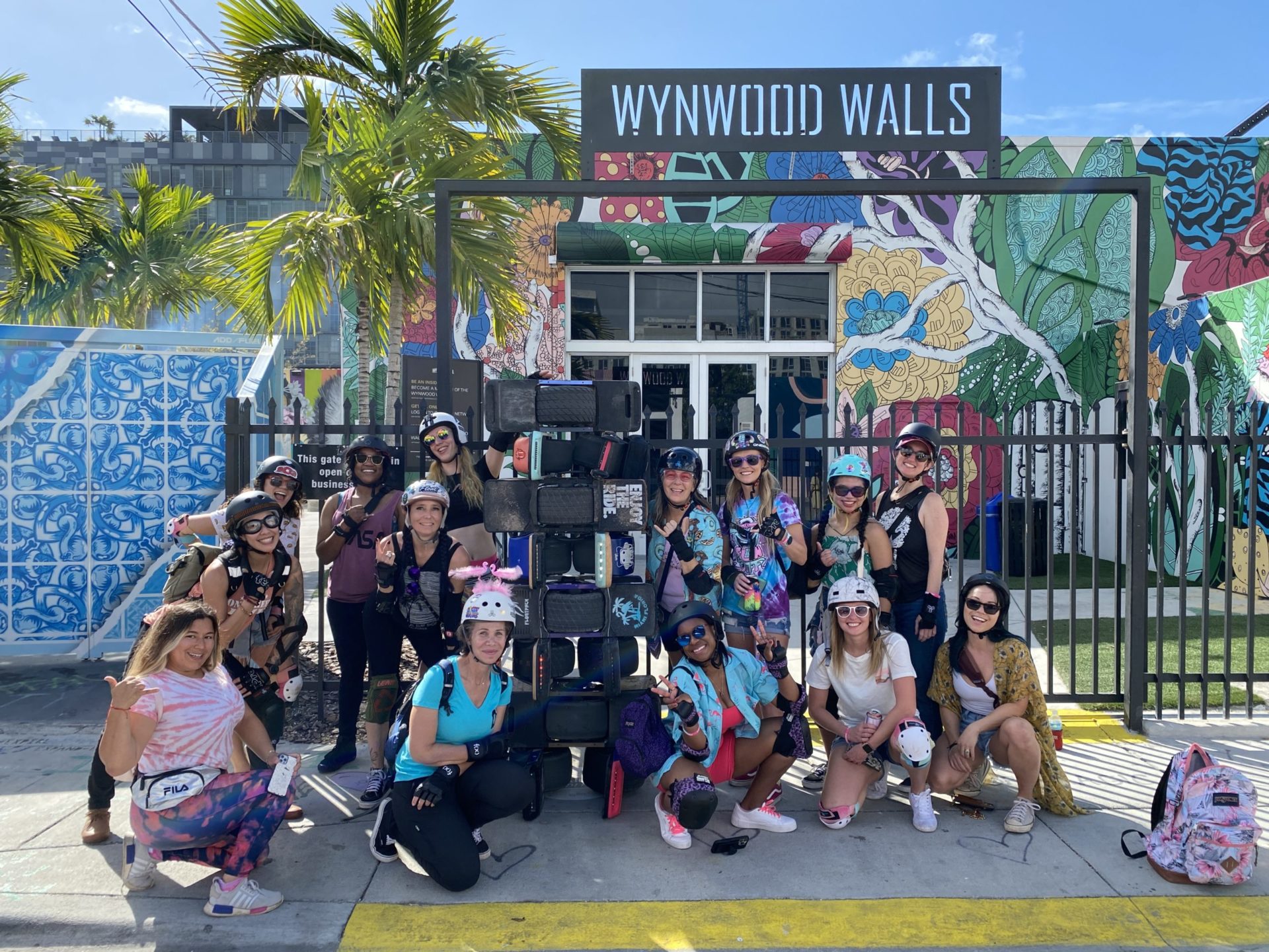 Drift Sisters pose at the entrance to Wynwood Walls for the Float Gang photo scavenger hunt.