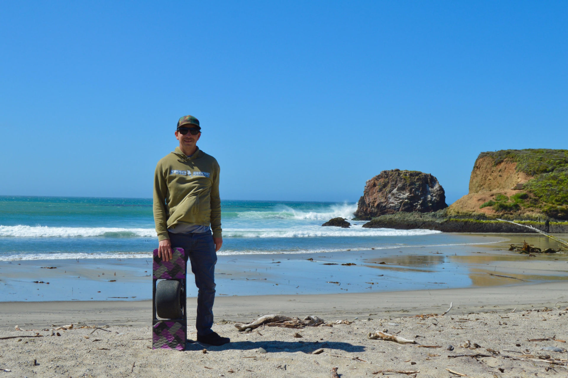 ProRide founder Paul Orehek with his Onewheel at the beach