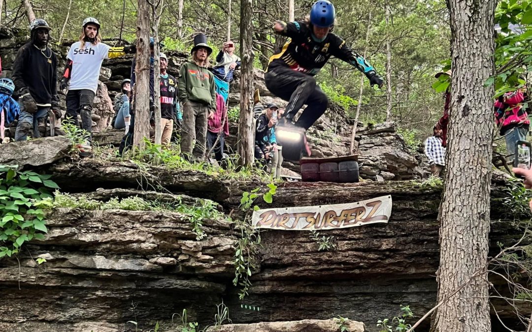 A Onewheel rider drops off a 6-foot ledge in the first ever freeride competition.